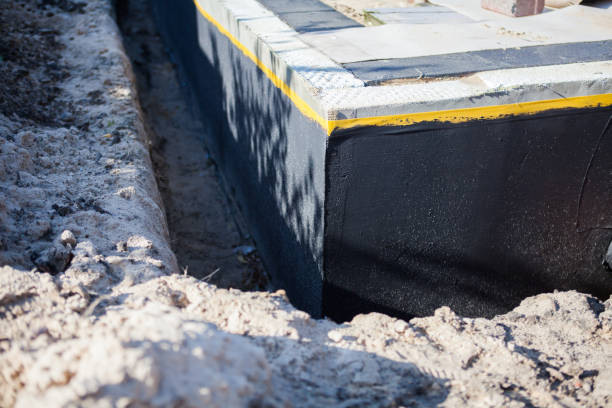 Professional Waterproofing technician working in Bringhurst, IN
